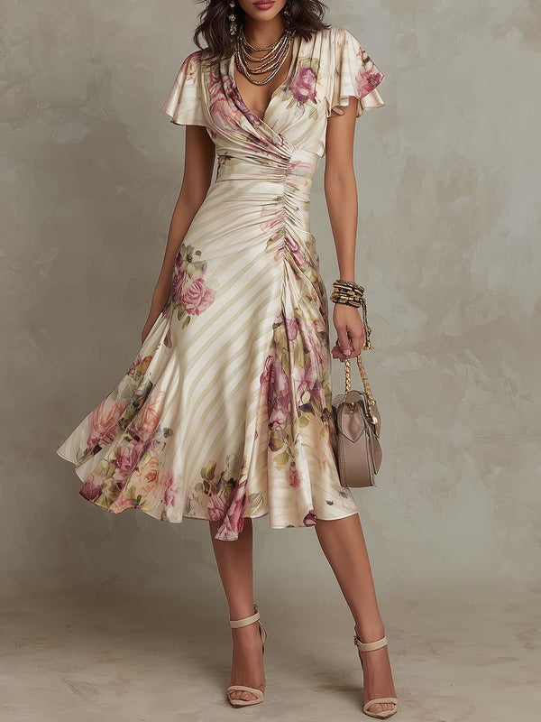 Luisa | Robe mi-longue en satin à motif floral rétro élégant