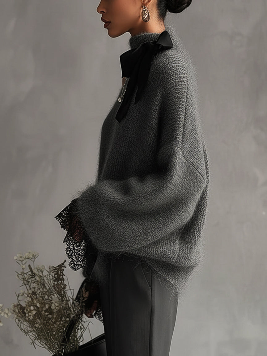 Chandail en tricot de mohair gris à poignets en dentelle